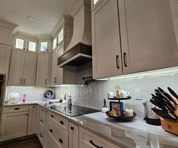 Kitchen counters lit by under-cabinet lights